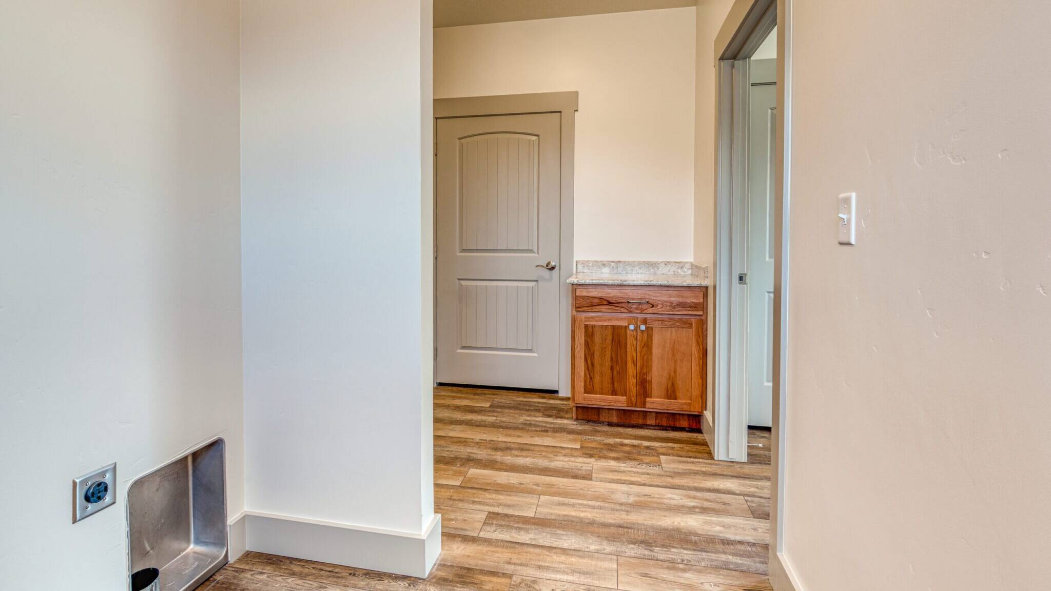 Laundry/Rear Foyer in The Country Cottage model home - built by Big Sky Builders in Hamilton, MT