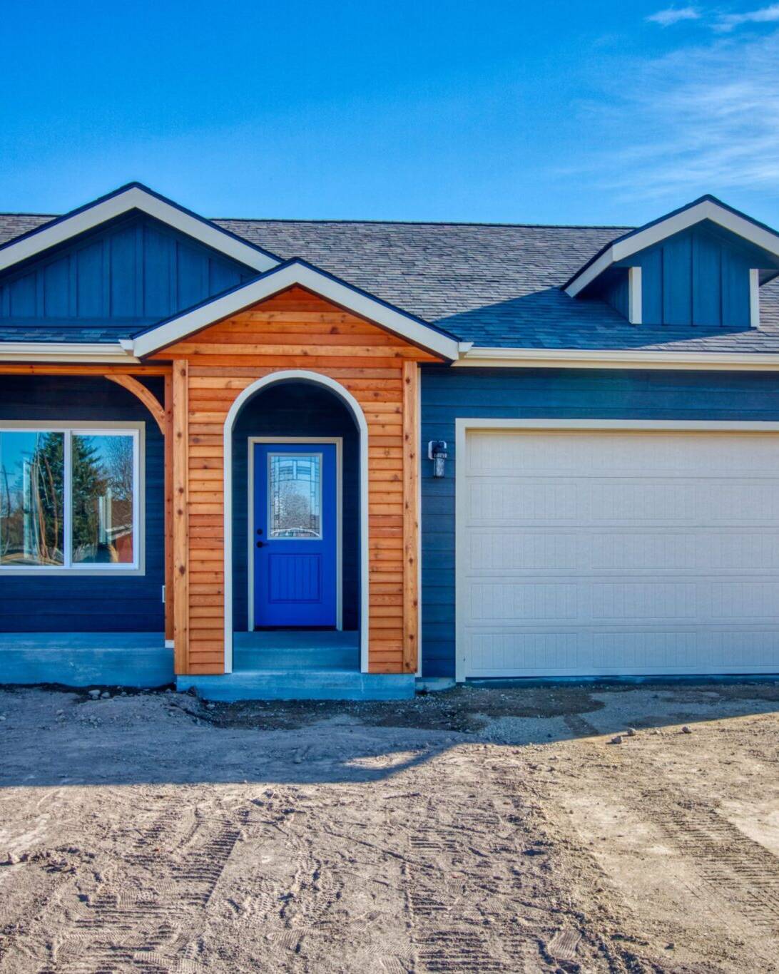 Front Exterior of the Mill Creek model home - built by Big Sky Builders in Corvallis, MT