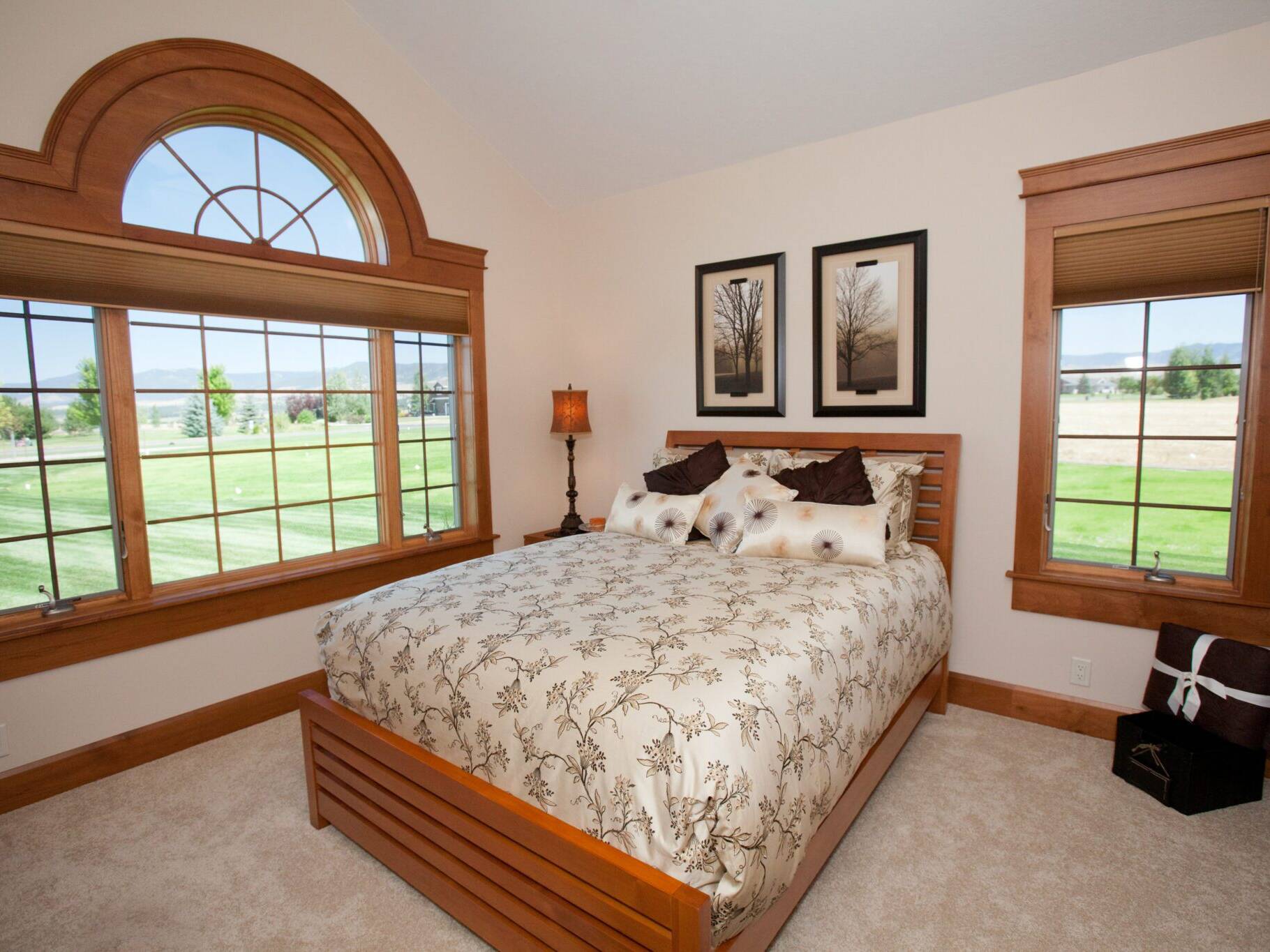 Guest bedroom inside a custom home built by Big Sky Builders near Hamilton Montana