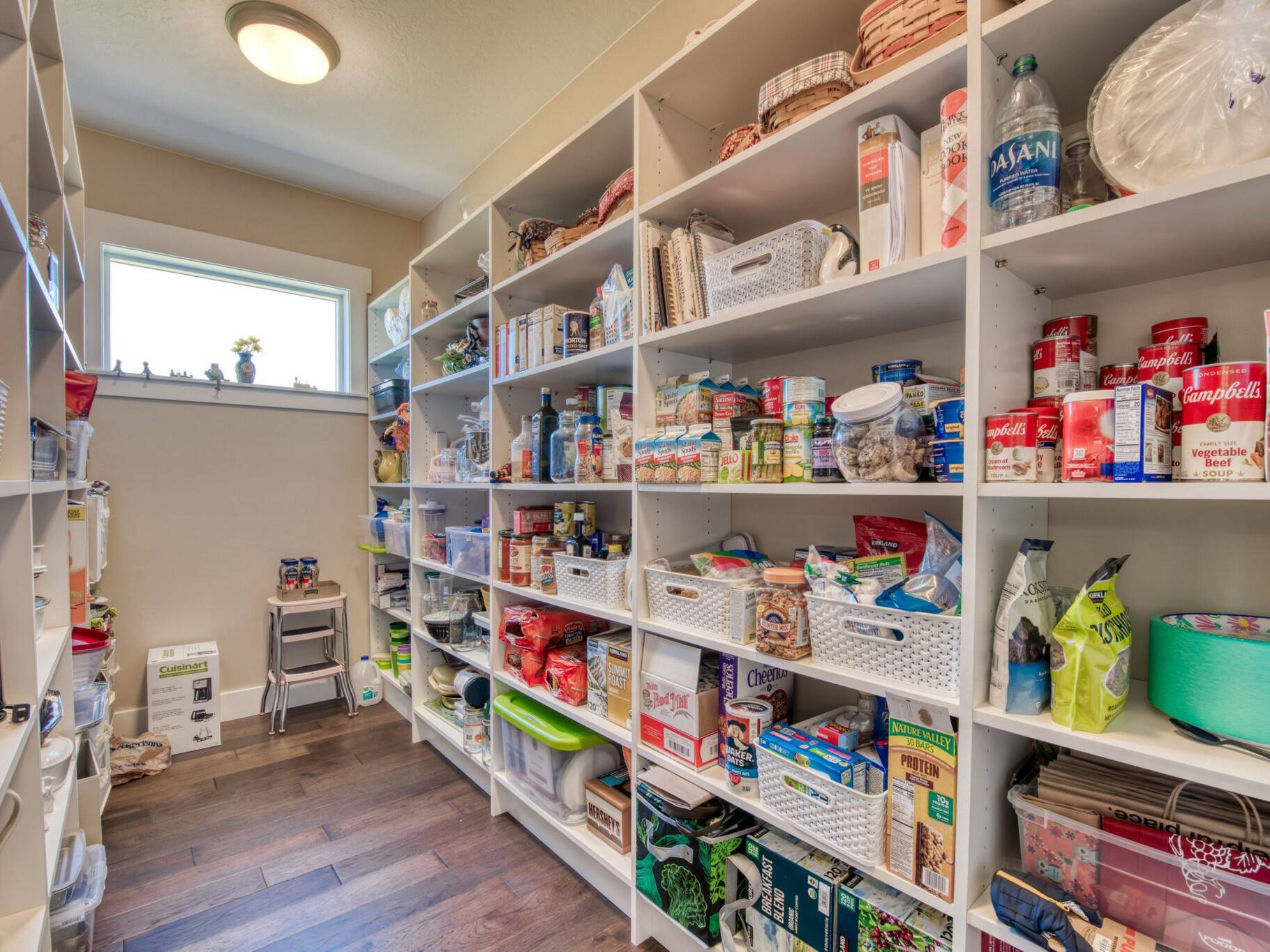 Large pantry with lots of storage in a custom home built by Big Sky Builders of Montana in Hamilton, MT