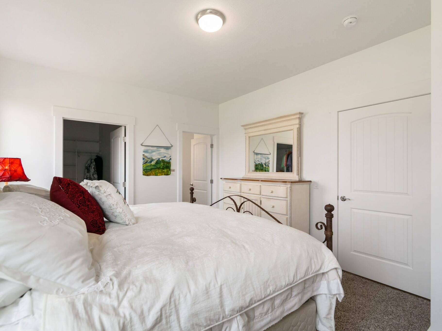 Master bedroom in The Seeley model home - Built by Big Sky Builder in Hamilton, MT