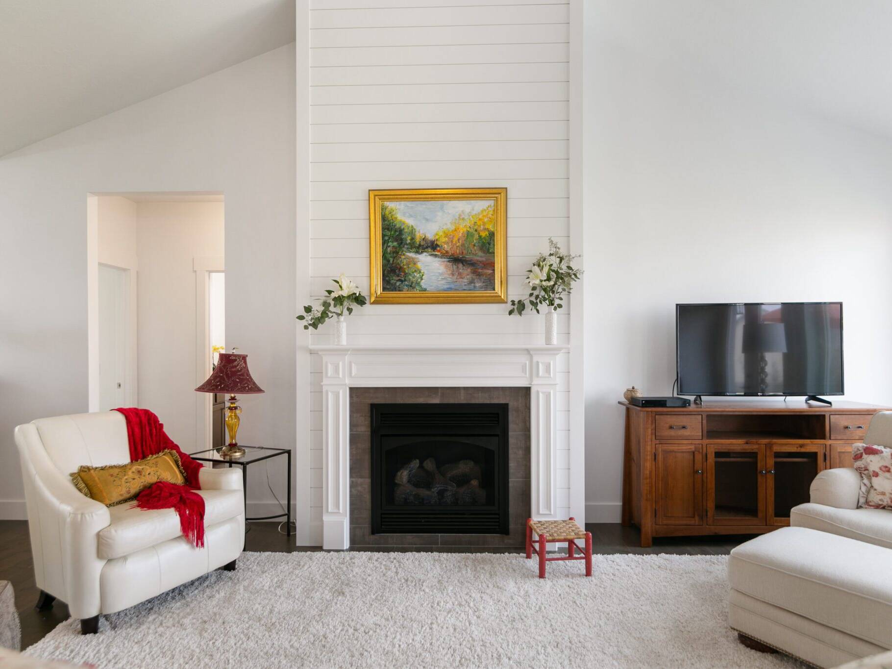 Living room and Fireplace in The Seeley model home - Built by Big Sky Builder in Hamilton, MT
