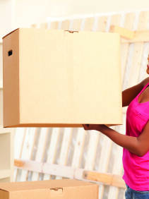 Woman moving boxes