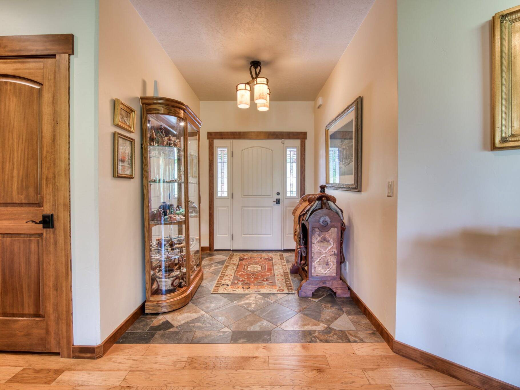 Entry foyer with tile floor in a custom house near Hamilton, MT