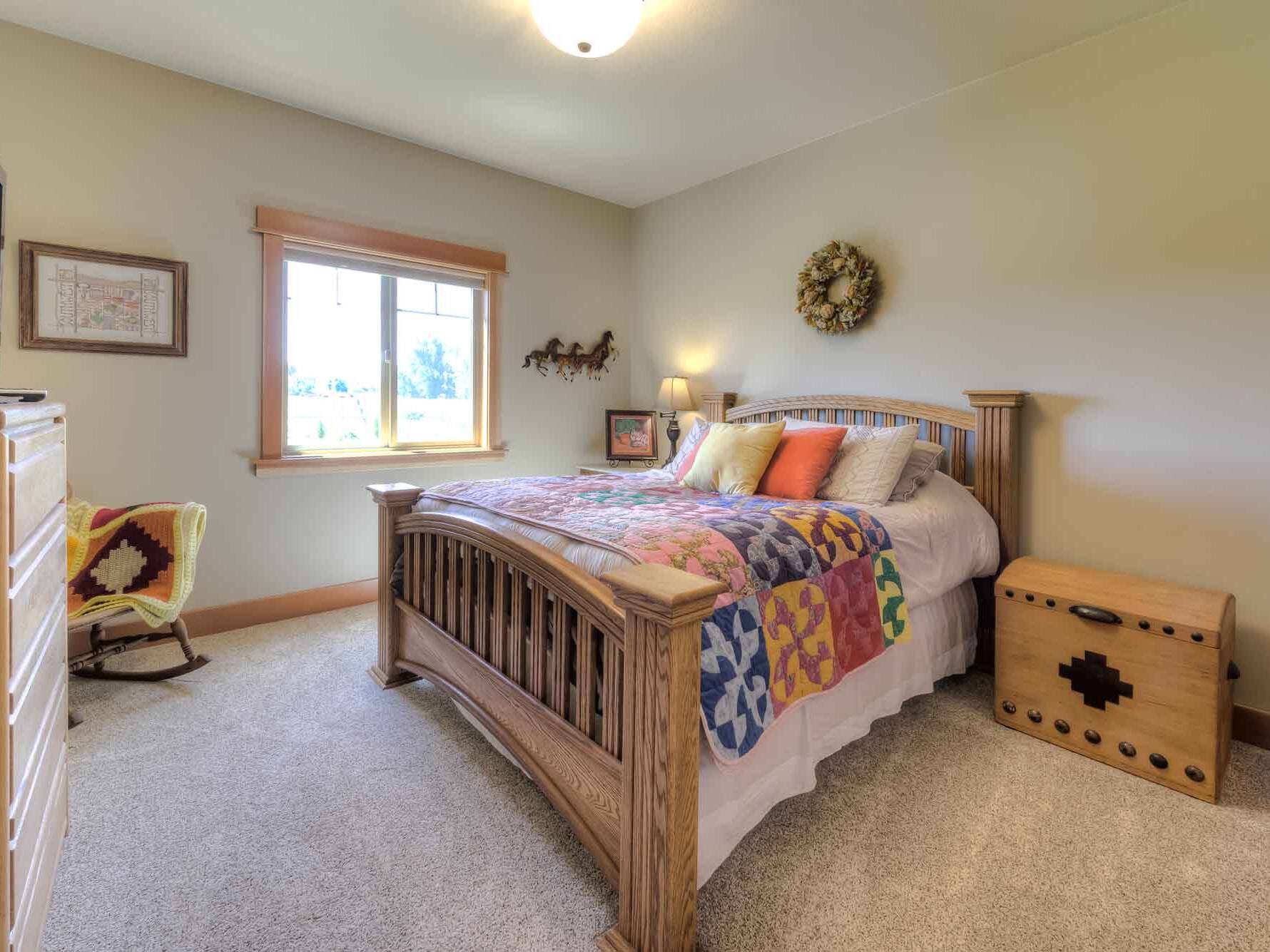 Guest bedroom in a custom home built by Big Sky Builders in Hamilton, Montana