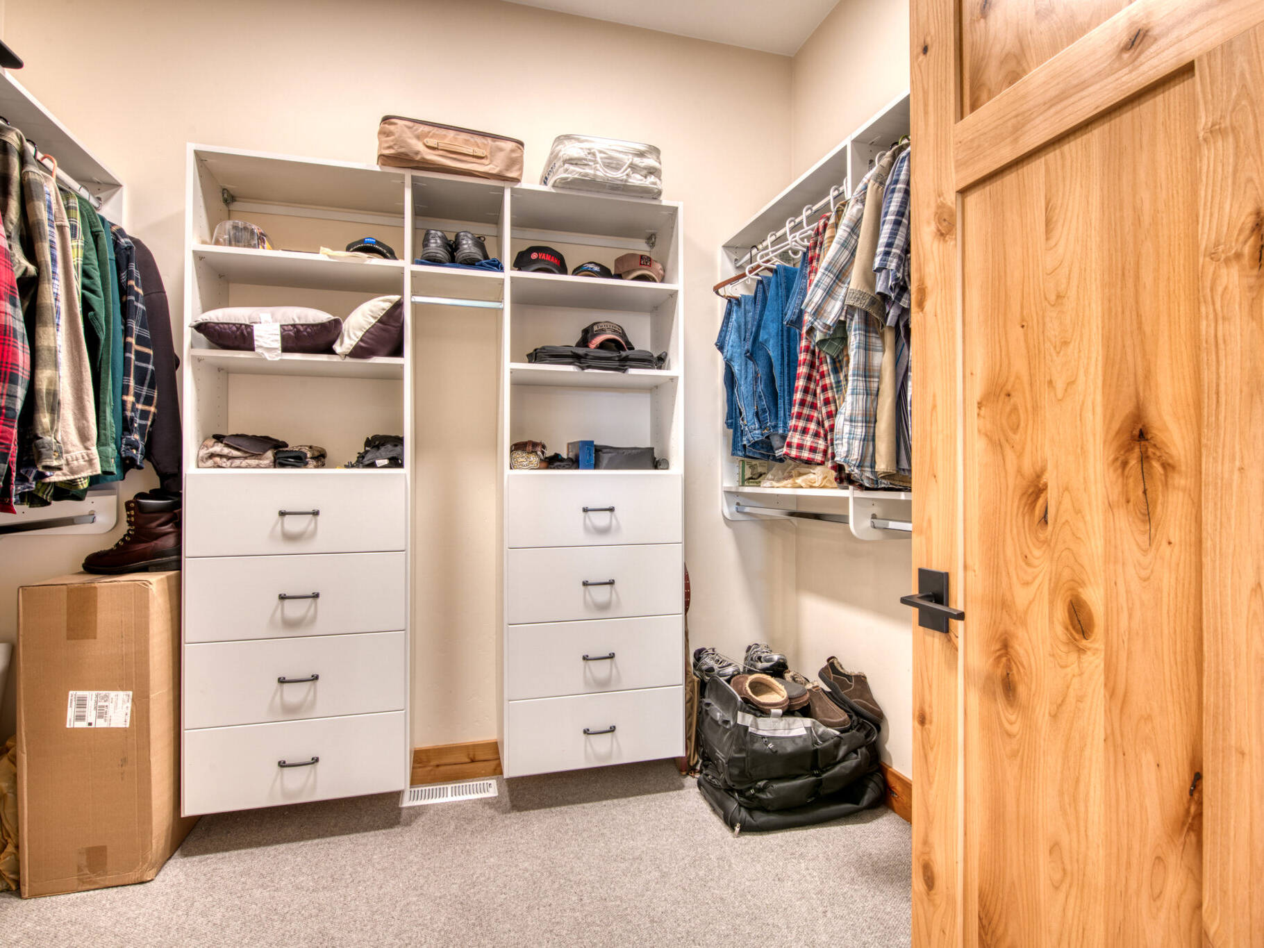 Closet shelving system in a custom home built by Big Sky Builders in Florence, MT