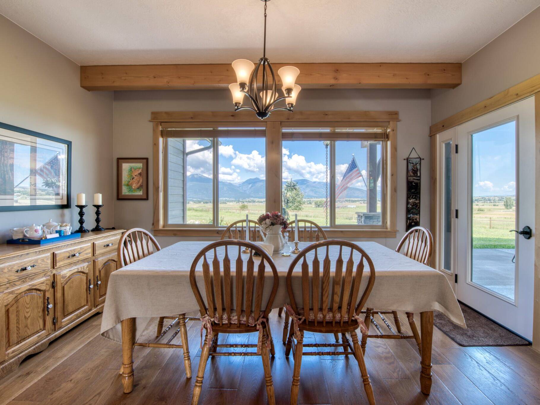 Dining area with ceiling beam work in a custom home built by Big Sky Builders in Stevensville, MT