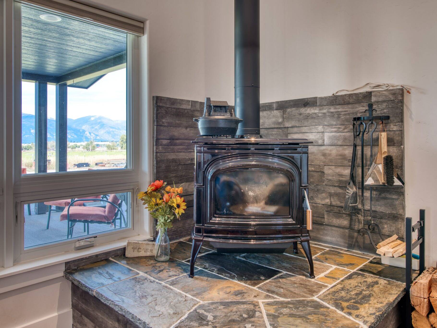 Wood burning stove in a custom home built by Big Sky Builders in Stevensville, MT
