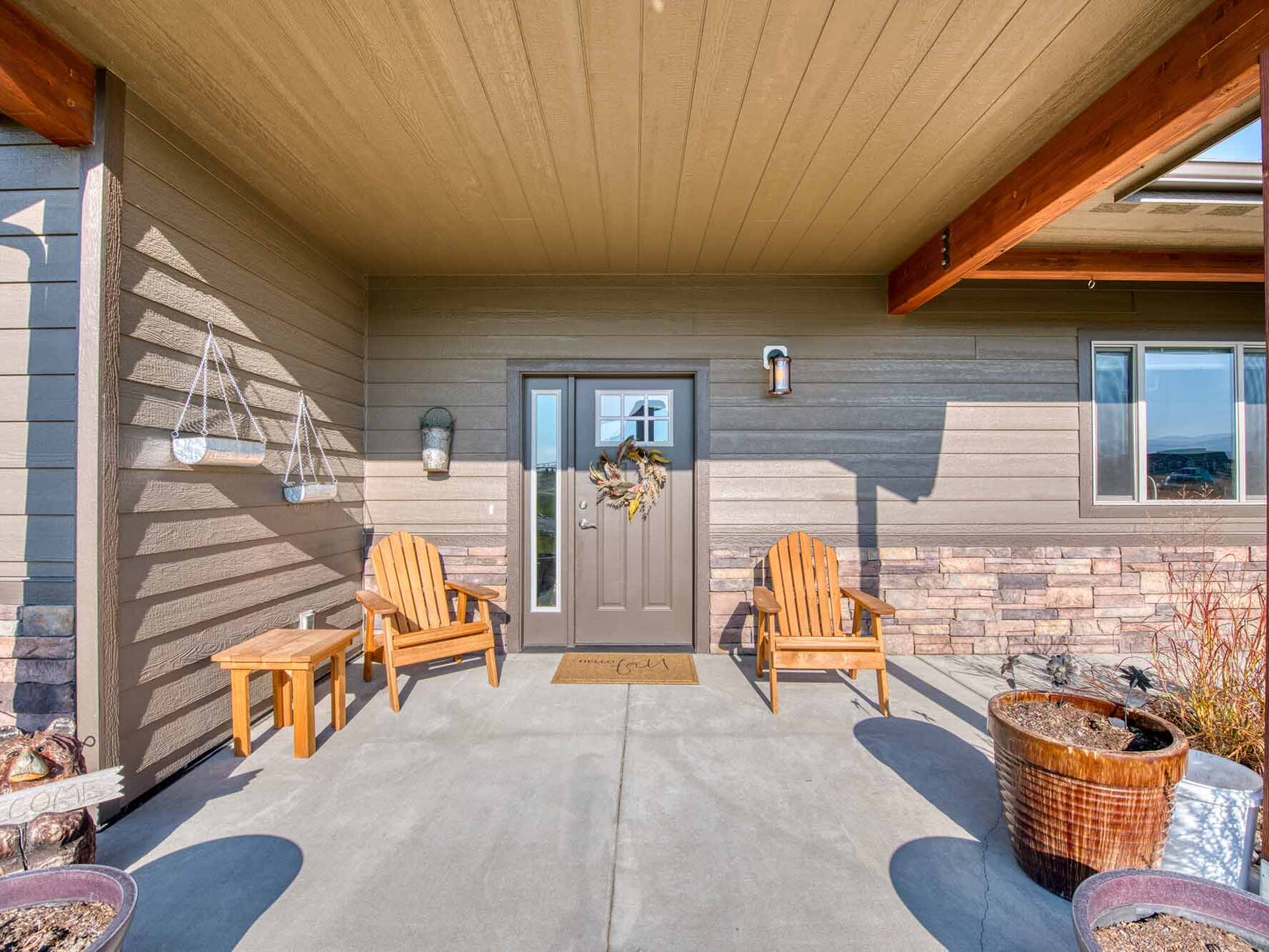 Entry porch of The Copper Creek model home - Built by Big Sky Builder in Florence, MT
