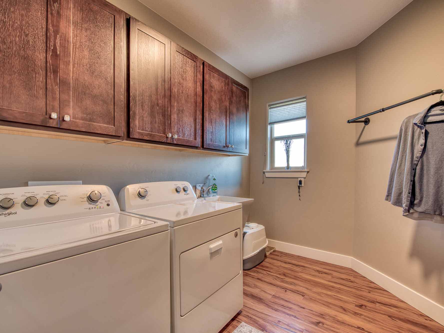 Laundry room in The Copper Creek model home - Built by Big Sky Builder in Florence, MT